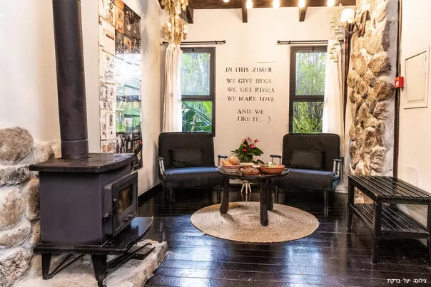 A cozy fireplace in the sitting area - Vanilla Grey, Had Nes, The Golan Heights and the Hermon
