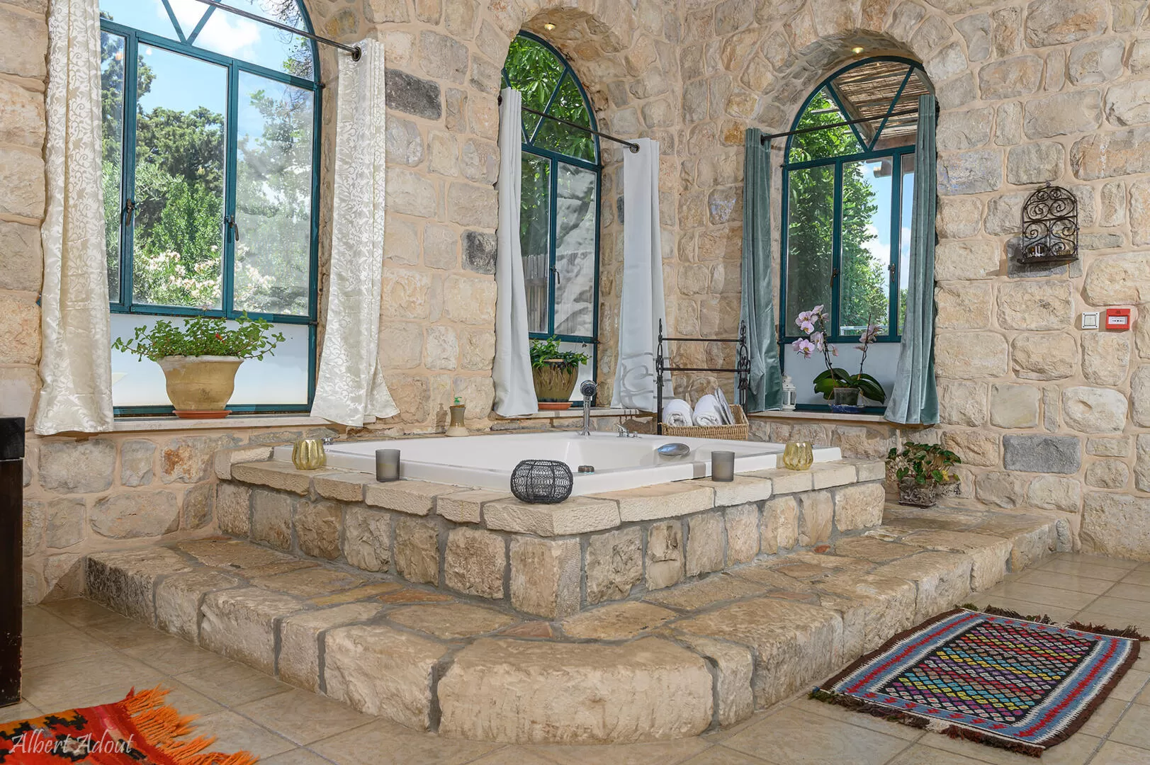 Impressive design of reclaimed stone with arched windows - Idyllia| Hapnina Beit Even Yukrateim, Amirim, Upper Galilee