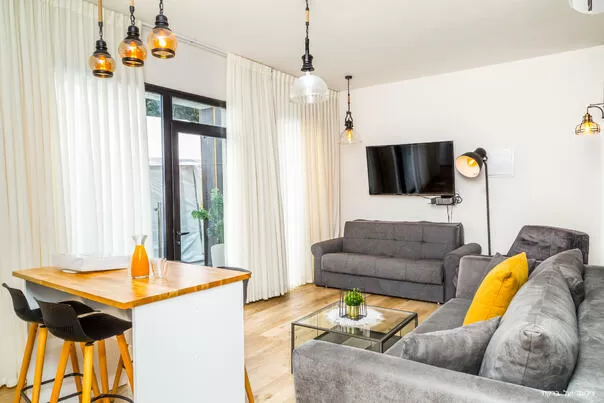 At Darna, each suite has a private interior space with a living room, kitchenette and dining bar - Shai's Villa, Even Menahem, Western Galilee