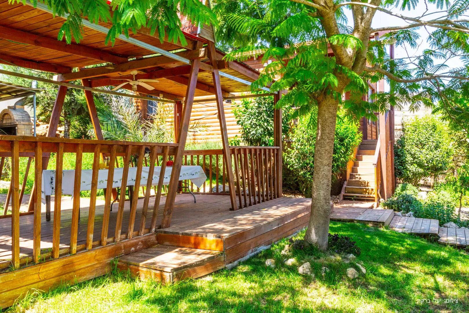 A space full of vegetation and pastoral seating areas - Ha Ofek Hayarok, Zareit, Western Galilee