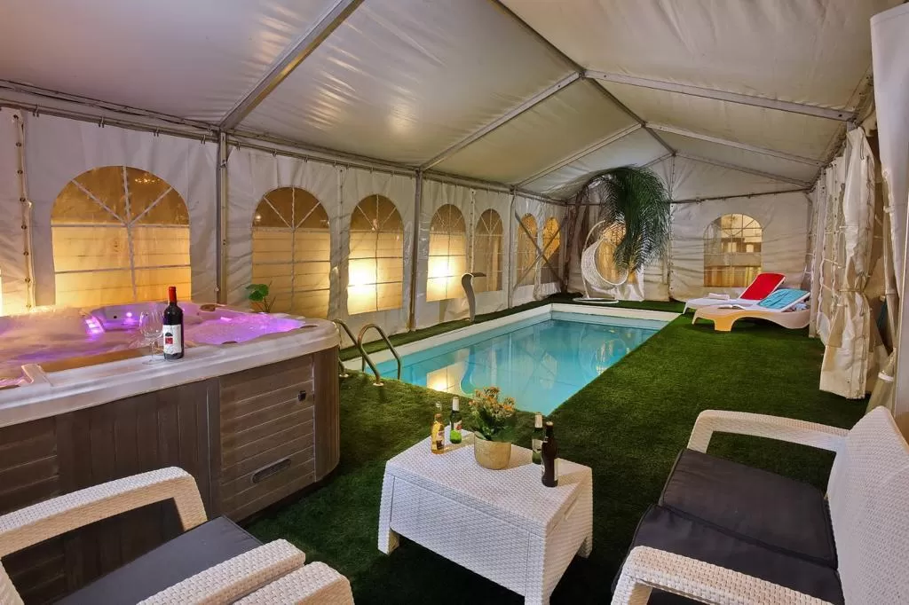 The villa has a heated indoor pool (about 32 degrees) and a pampering spa jacuzzi next to it - Villa David couples & families, Margaliot, Upper Galilee
