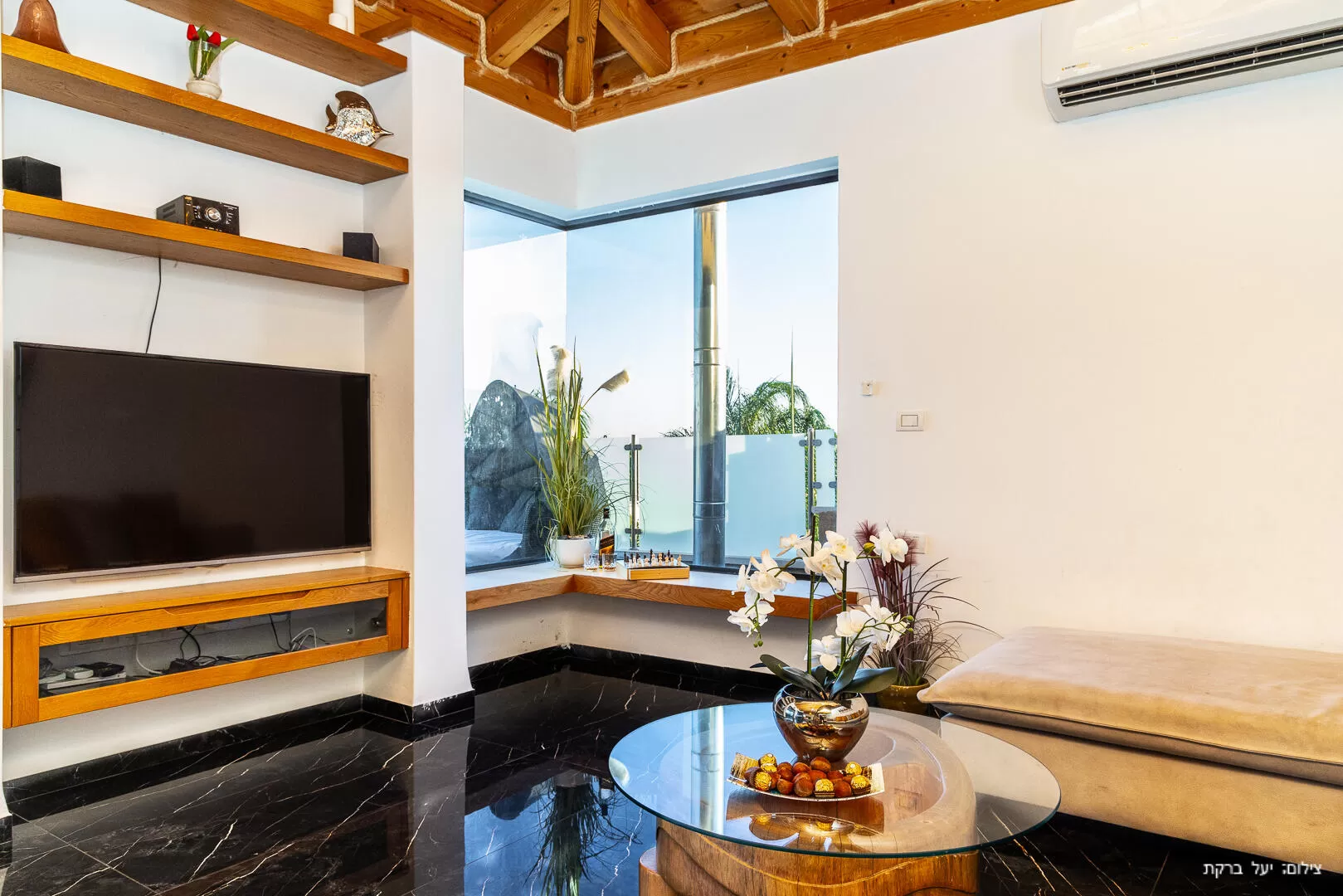 In the living room, a 55-inch smart TV with connection to YES - Maiori Boutique, Mishmar Jordan, Upper Galilee
