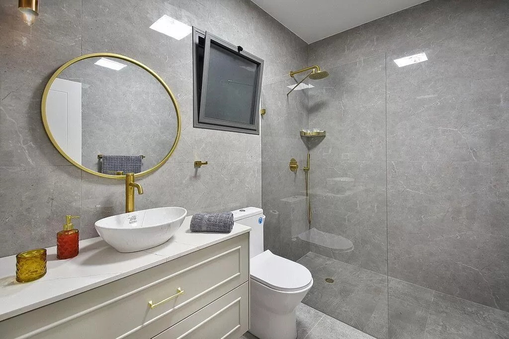 A bathroom made of shees with golden faucets - Osher Suite, Avdo, Western Galilee