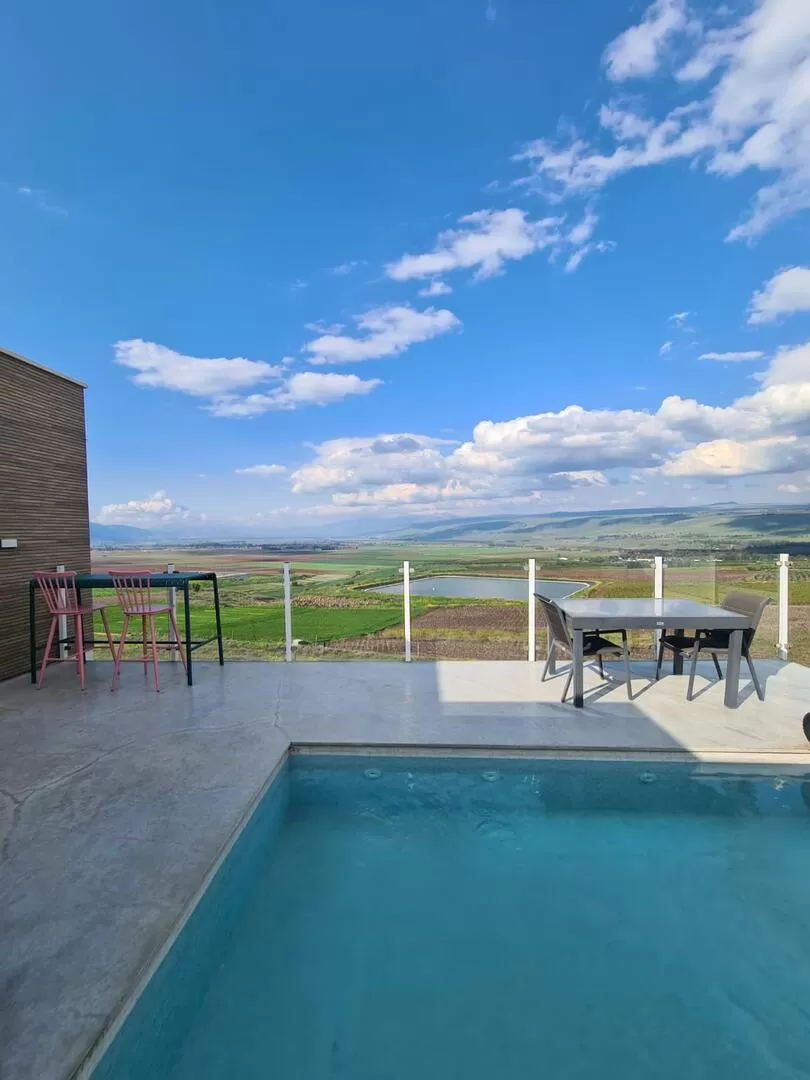 A heated pool in winter sits in front of the view - Shik's, Mishmar Jordan, Upper Galilee