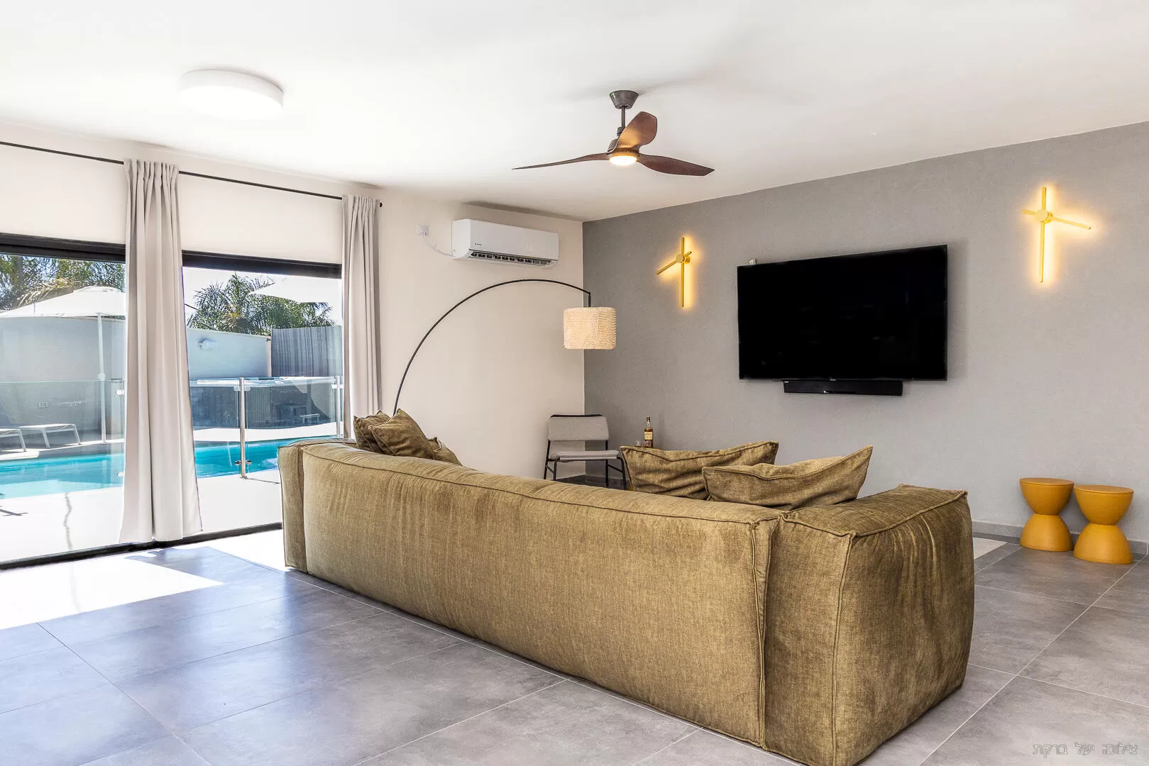 The living room space is luxurious with a huge sofa for sleeping - Villa Meshek 19, Even Menahem, Western Galilee
