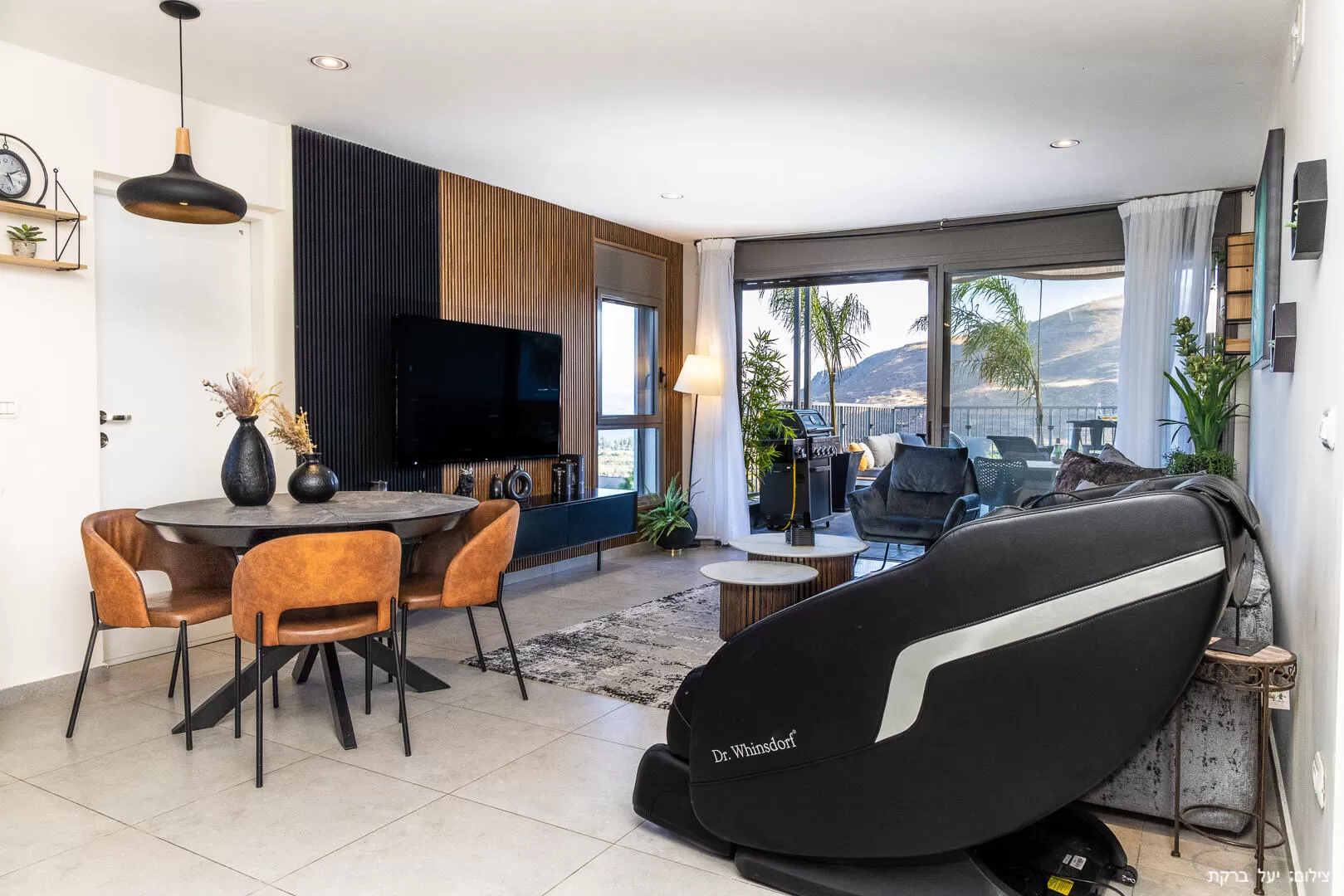 In the living room there is a pampering massage chair - Nof Harbel Boutique Suite, Migdal, Sea of Galilee Area