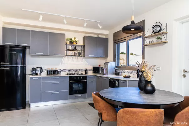 A well-equipped and comfortable kitchen for cooking - Nof Harbel Boutique Suite, Migdal, Sea of Galilee Area