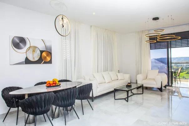 The living room space in the villa with access to a balcony with a view - Omer BaGalil, Even Menahem, Western Galilee