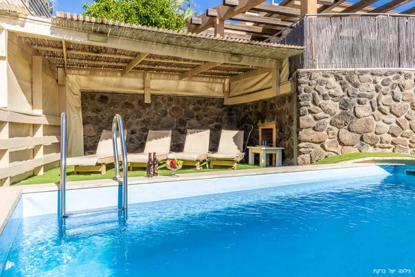 Shared pool (heated in winter) with sunbeds next to it - Or Hakeren, Had Nes, The Golan Heights and the Hermon