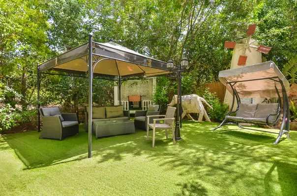 A pleasant space full of vegetation and seating areas for staying and joint activities - Achuzat Regei Kesem, Goren, Western Galilee