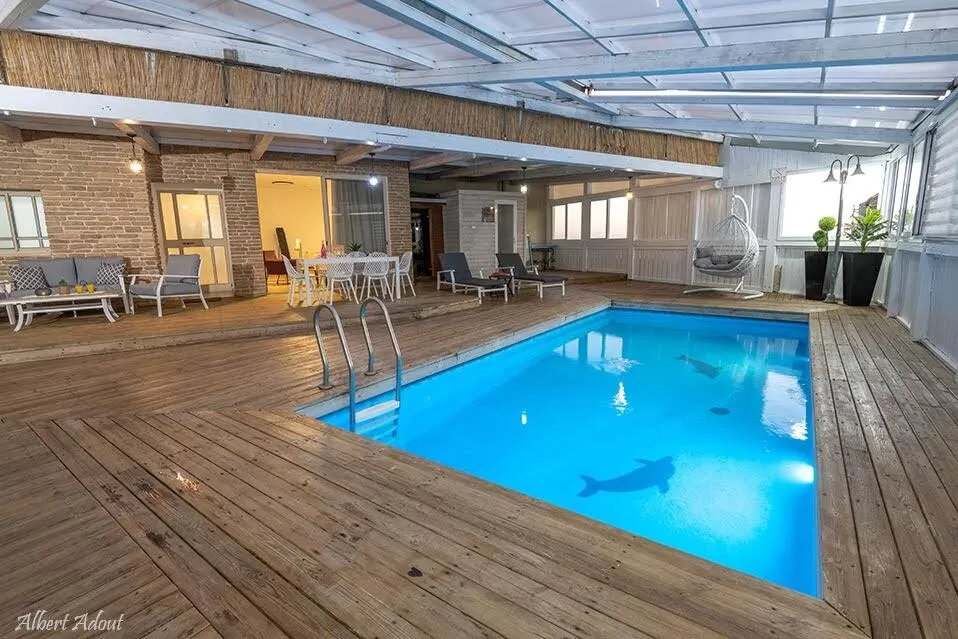 The private pool is heated, measuring 7.50x3.60 meters - Ahuzat Lorraine, Ein Ya'akov, Western Galilee